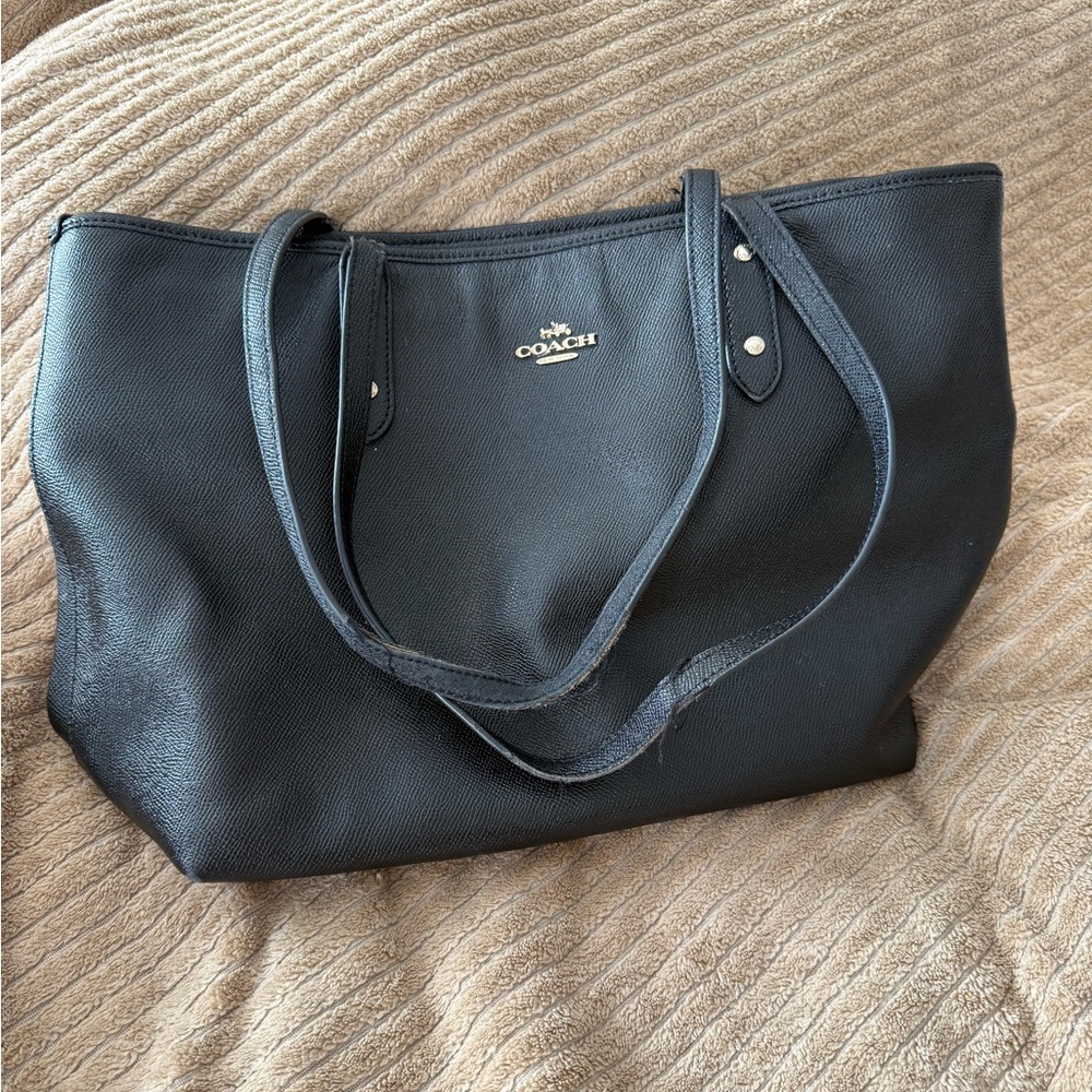 Coach black leather City Tote bag in used condition.